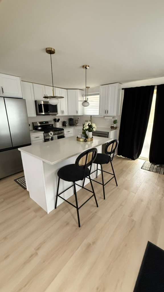 Modern kitchen cleaned and ready for Airbnb guest arrival